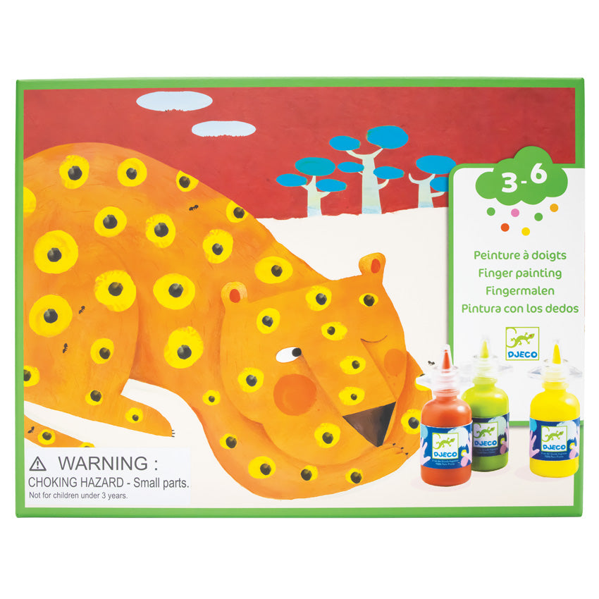 The Djeco Finger Tracks set box. It shows a leopard sleeping with one eye peaked open. Behind him are blue trees in a red sky. Over the picture, in the bottom-right corner, it shows some of the paint bottles. To the left, and in front, of the box are 2 paint bottles, blue and yellow, in front of the instruction book open to show the snake project.