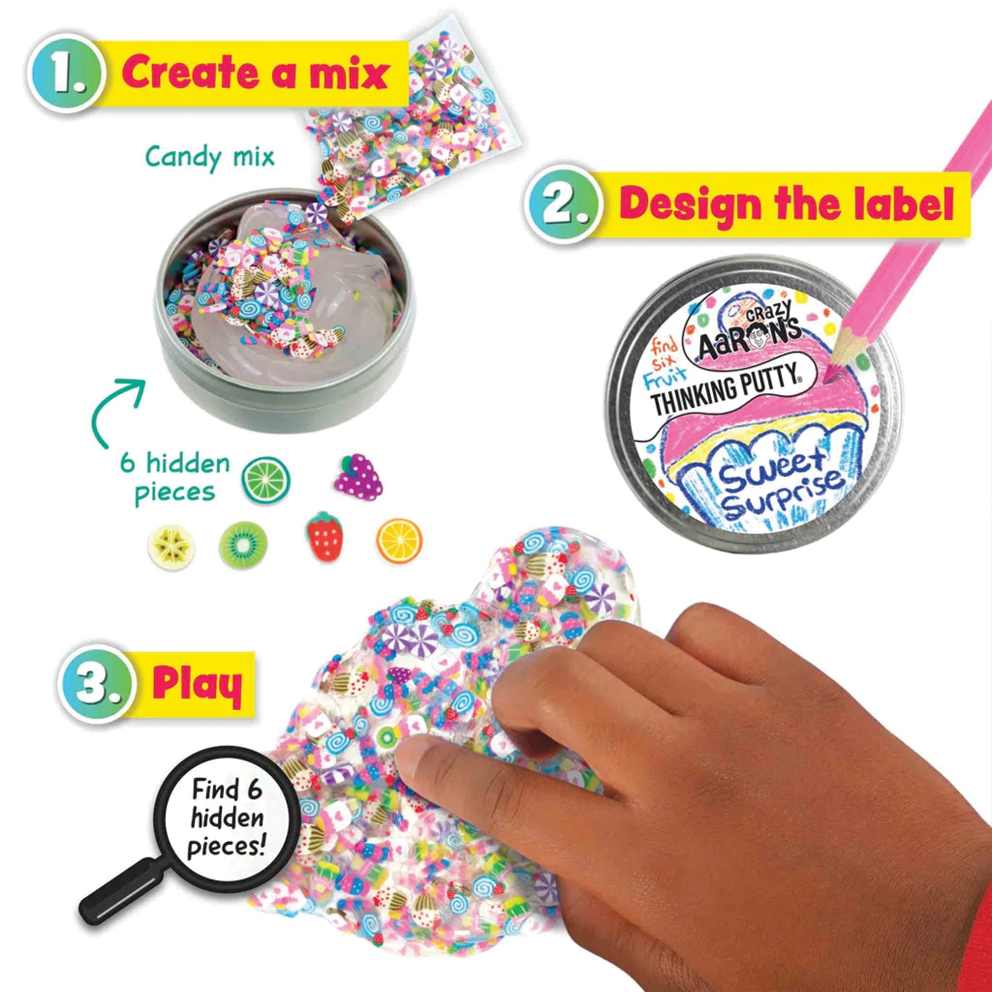 Mixed By Me Hide Inside Thinking Putty Kit. The image shows 3 how to steps. 1, create a mix. You mix the candy and fruit pieces inside the clear putty in the tin. 2, design the label. It shows a pink colored pencil drawing a cupcake on the label on the tin lid with the words “sweet surprise.” 3, play. It shows a hand playing with the mixed putty, pointing out a kiwi fruit among the candy pieces. A magnifying glass in the lower-left directs you to “find 6 hidden pieces.” 