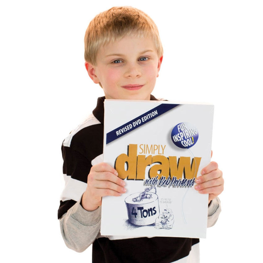 Young blonde boy holding the simply draw paper pack. On the cover is text that reads Simply Draw with Bob Parsons and shows a sketch of a 4 ton round weight on top of a very muscular bald man with a long mustache.