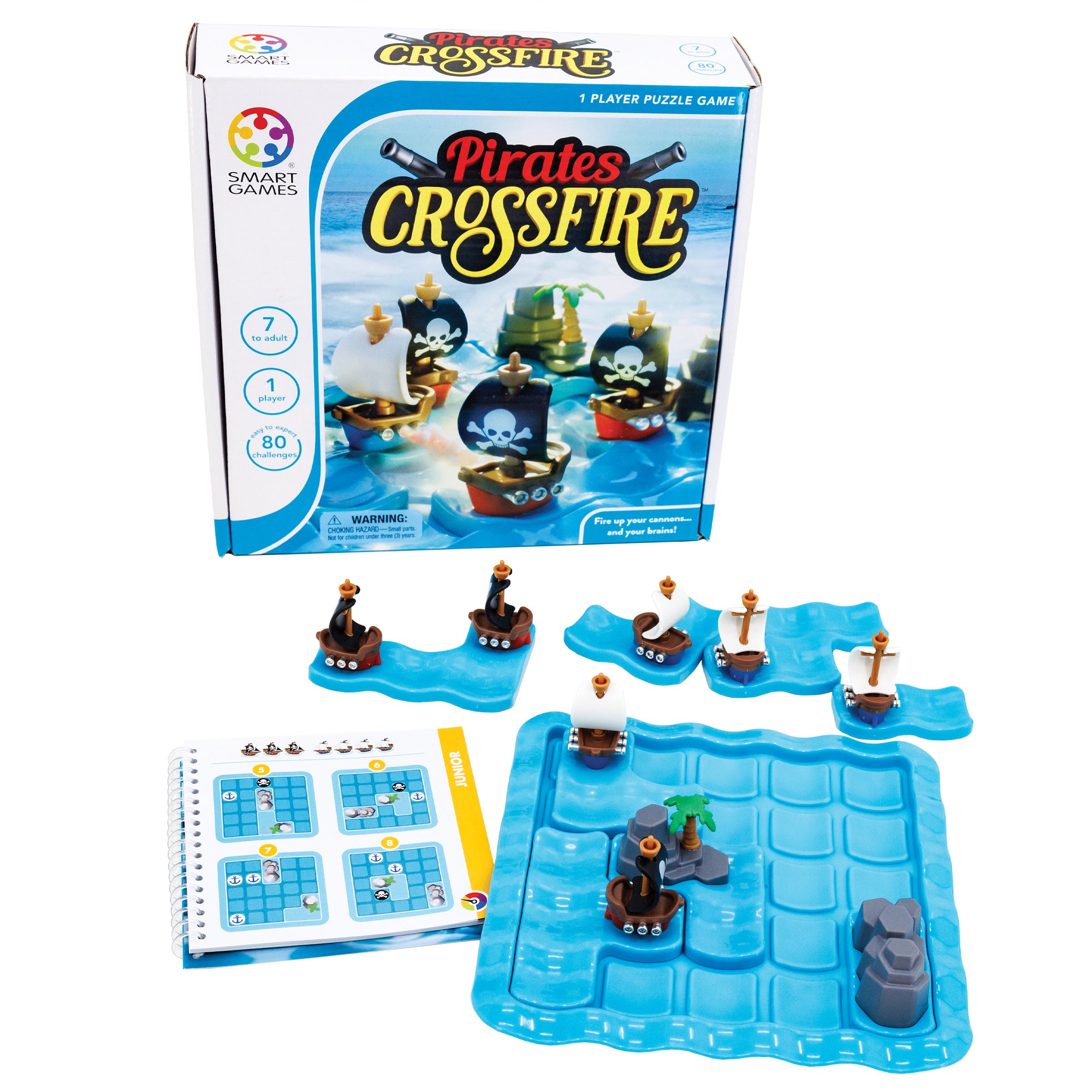 Pirates Crossfire game. The gameboard is blue and wavy in a square shape with rounded corners. There are 4 pieces set in place on the board; one white-sailed ship, one black-sailed ship, and 2 rock pieces. There are 4 ship pieces off the board to the top. On the left is the instruction booklet open to a junior puzzle. The game box in the background shows the game with pieces in play.
