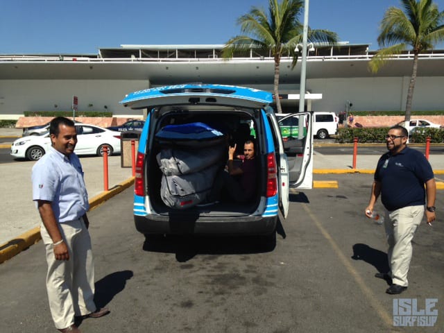 loading the paddle boards up in the taxi sayulita mexico