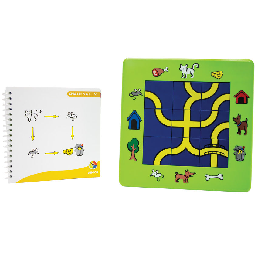 The Cat and Mouse game with a completed challenge. The game board is bright green with illustrations around the board of pets, outside objects, pet snacks, and pet homes. There are blue and yellow square pathway pieces placed in the middle of the board, in a grid of 3 by 3. To the left is the instruction booklet, open to show a challenge. 