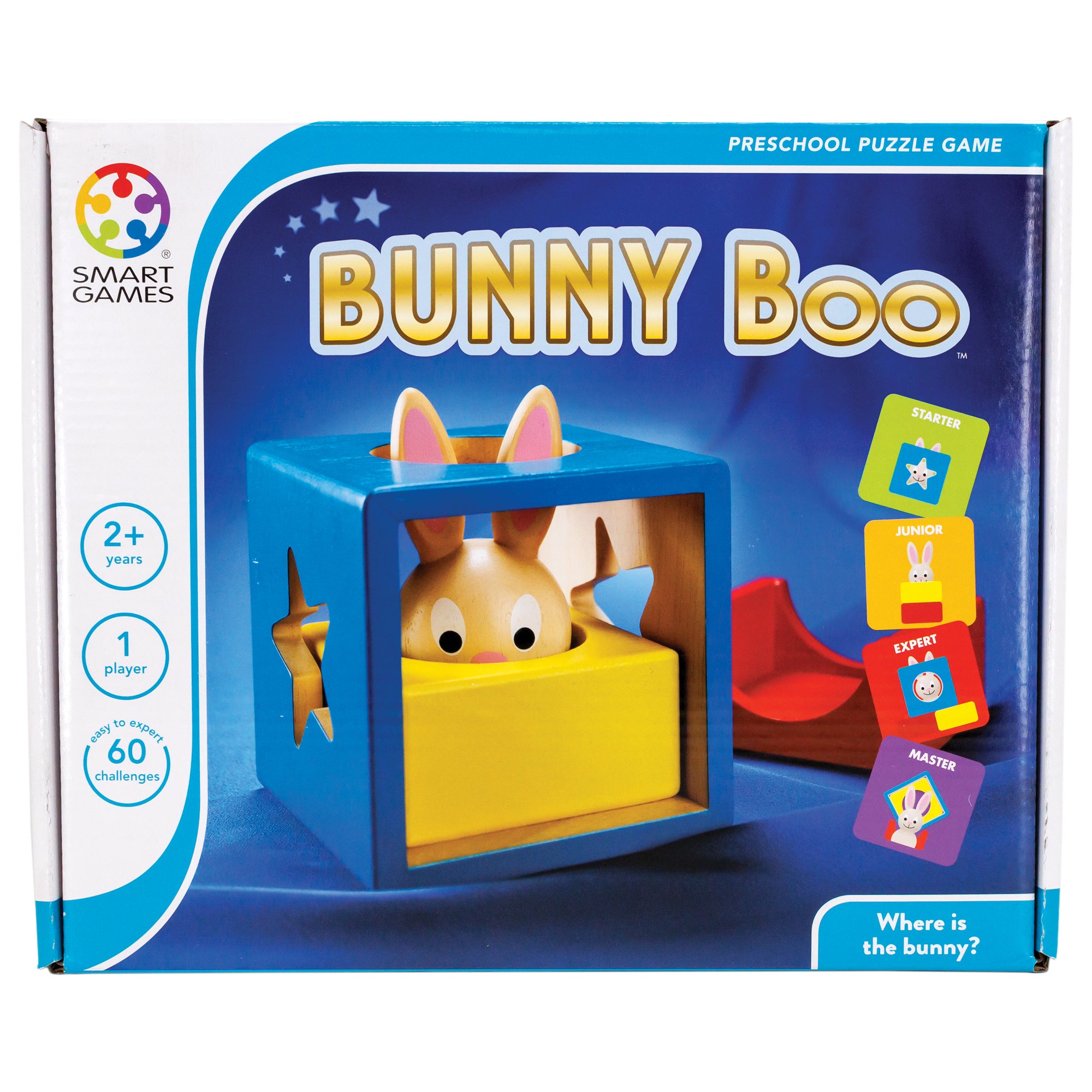 Bunny Boo game box standing up to show the cover. The main picture on the cover shows the bunny piece tucked inside a yellow block, that is tucked inside a hollow blue block with shapes cut out on the sides. Off to the right is a red piece that shows a half circle piece cut out of the middle. There are 4 challenge cards down the right side in different colors. The box indicates that the game is 1 player for age 2 and up. There are 60 challenges.