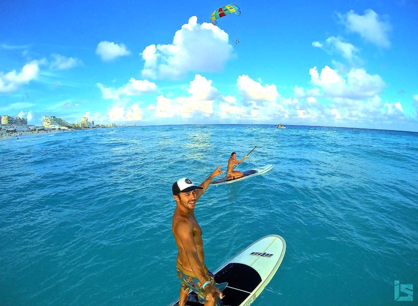 team rider marc waves hello while enjoying the warm waters of Cancun Mexico