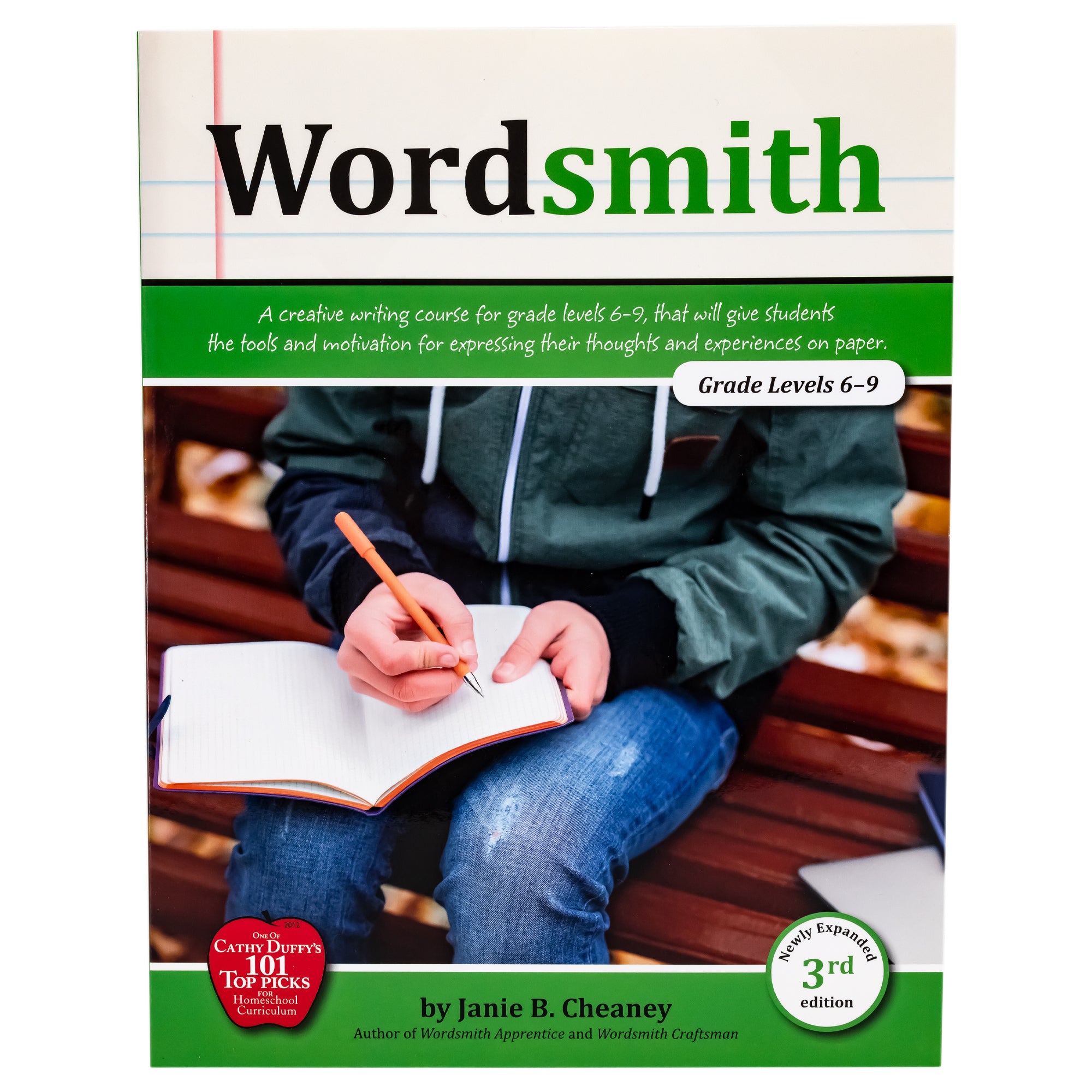Wordsmith cover. The background shows notebook paper at the top and 2 green bands under. Between the green bands is a picture of a boy writing in a journal.