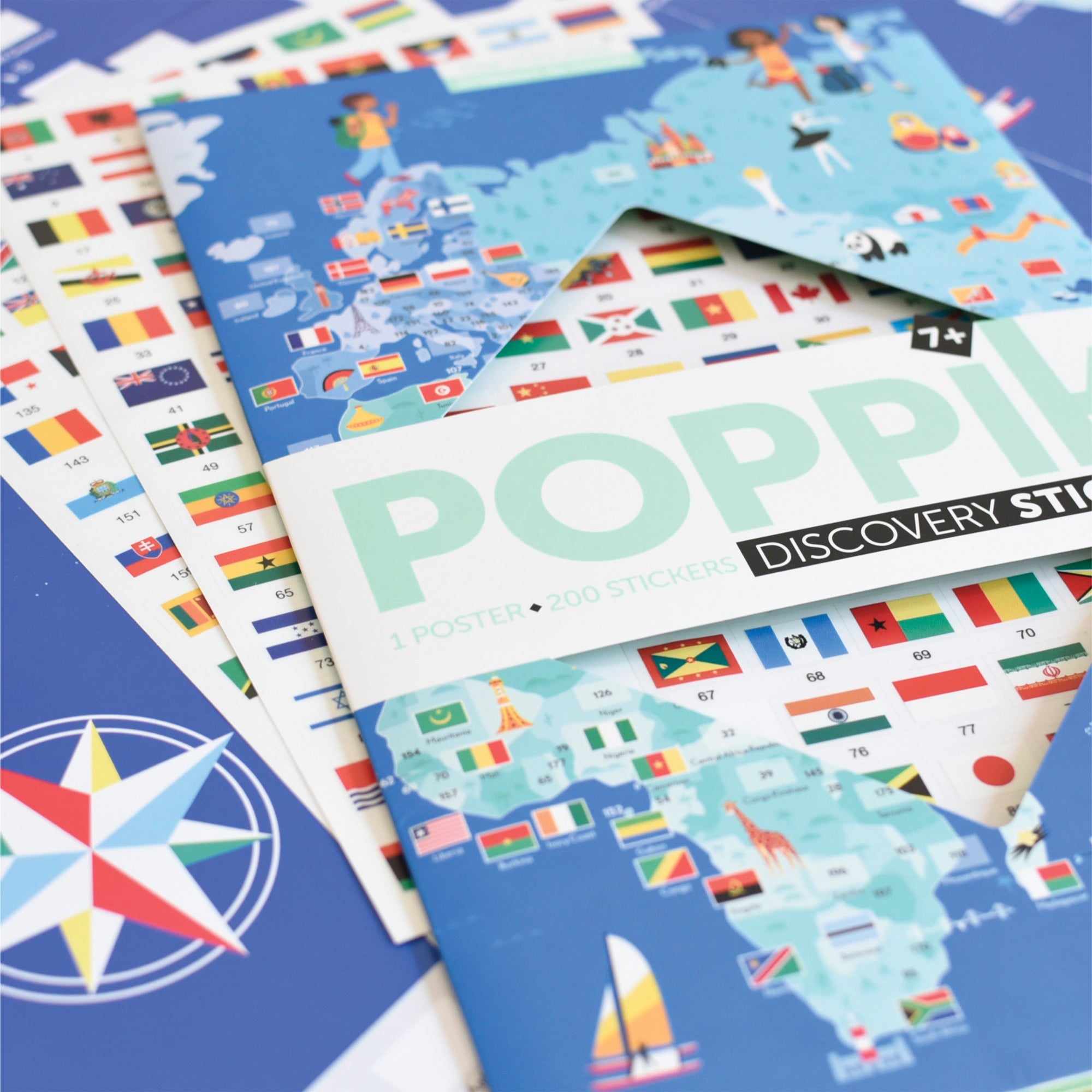 Poppik Flags of the World package cover. Cover map is mainly blue colors with colorful graphics of children and country-related items placed throughout. Poppik text is clear while the rest of the picture is slightly out of focus.