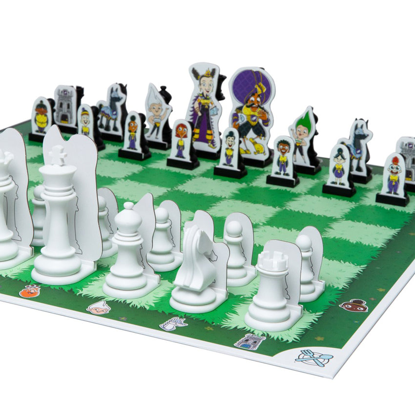 Story Time Chess game board setup up with all the pieces in the starting position. The game board squares are green grass, alternating darker green and lighter green.  The white pieces on the bottom side show the standard pieces. They have character cut-outs in front of them, but you are not able to see from this angle, so they are just white cut-outs. On the other side are the black pieces. You can see all the colorful character cut-outs. All pieces are in their starting position.