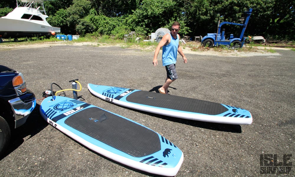 jim prepares the isle inflatable stand up paddle boards