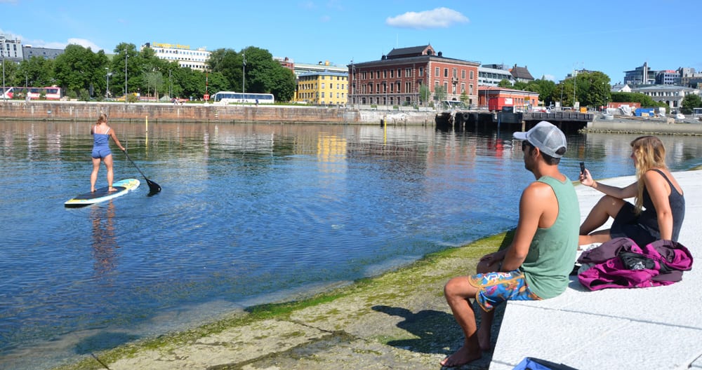marc spreading the gospel of paddle boarding at the waterfront in Oslo