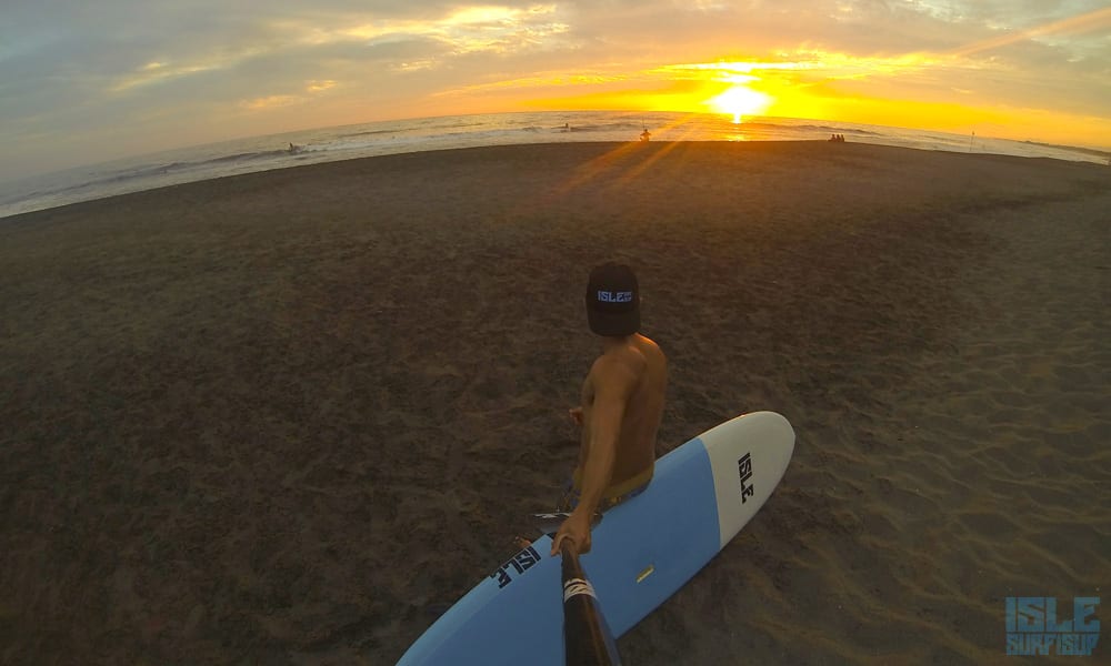 marc with a versa paddle board in sayulita mexico sunset