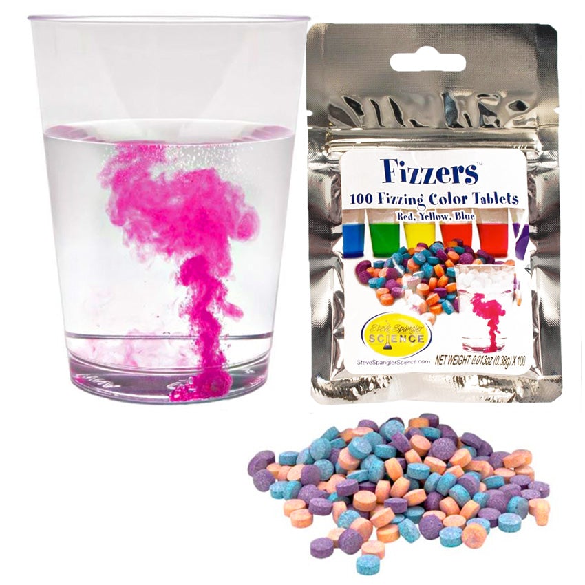 On the left is a glass with water in the process of being colored by a red Color Fizzers tablet. On the right is a Foil colored Color Fizzers pouch package. On the package is a sticker label showing colored water in glasses with tablets in front and a glass with water in the process of being colored by a red tablet and the Steve Spangler Science logo located in the lower-left of the label. On the bottom-right is a pile of orange, blue, and purple color tablets.