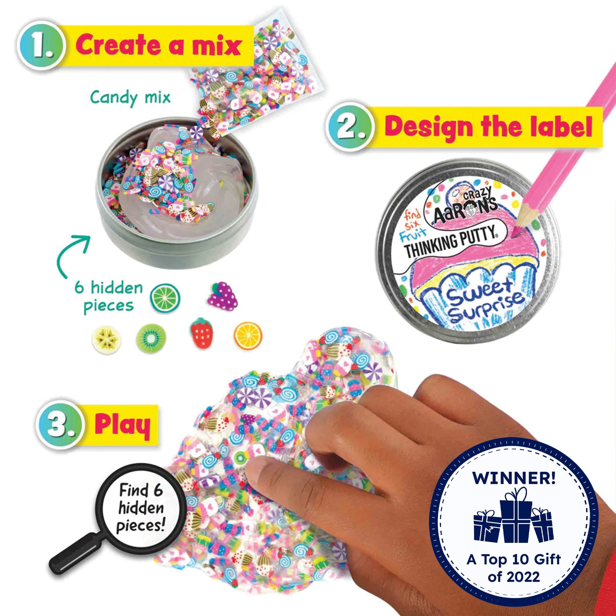 Mixed By Me Hide Inside Thinking Putty Kit. The image shows 3 how to steps. 1, create a mix. You mix the candy and fruit pieces inside the clear putty in the tin. 2, design the label. It shows a pink colored pencil drawing a cupcake on the label on the tin lid with the words “sweet surprise.” 3, play. It shows a hand playing with the mixed putty, pointing out a kiwi fruit among the candy pieces. A magnifying glass in the lower-left directs you to “find 6 hidden pieces.” Timberdoodle award winner.