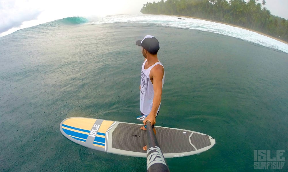 team member marc in Indonesia on a phantom touring board