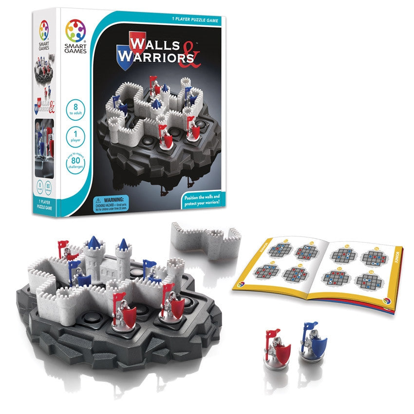 Walls & Warriors game contents and box. In the back is the box with the game on the cover. In front, is the game board with pieces placed on top. The game base looks like a gray rock island. There are castle wall pieces and silver knight pieces with red and blue flags and shields placed on top and a few off to the side. There is a game booklet open to show challenges off to the right.