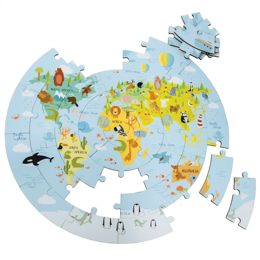 The Wooden World Map Puzzle mostly put together with several pieces off to the side. The puzzle is circle shaped and the picture is of the globe with illustrations of animals represented by their country.