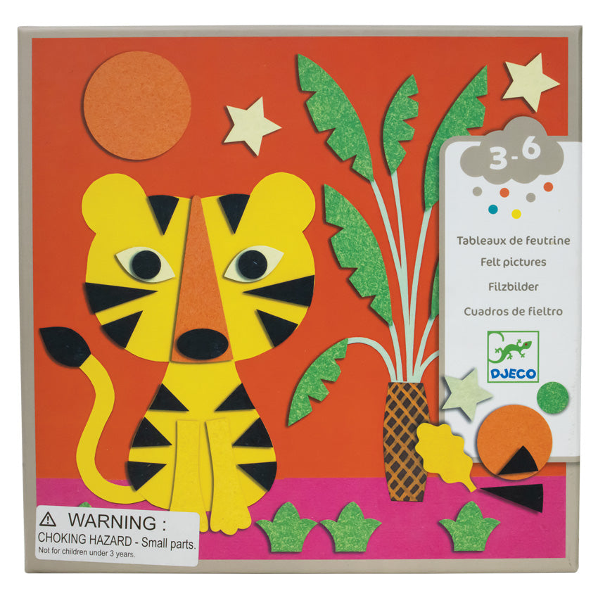 The Djeco Sweet Nature Felt set square-shaped box. The cover is mainly red with a gray border. There is a tiger in the lower-left with a sun and stars overhead. To his right is a palm tree and along the pink ground are bush sprouts. The age recommendation on the box is for ages 3 to 6.