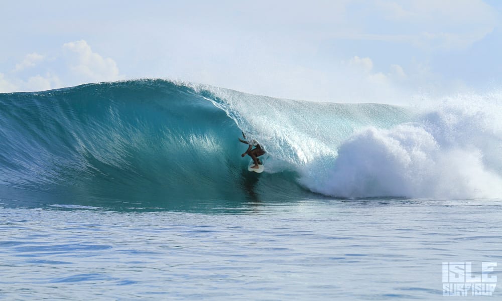 dirk getting barreled in a perfect wave