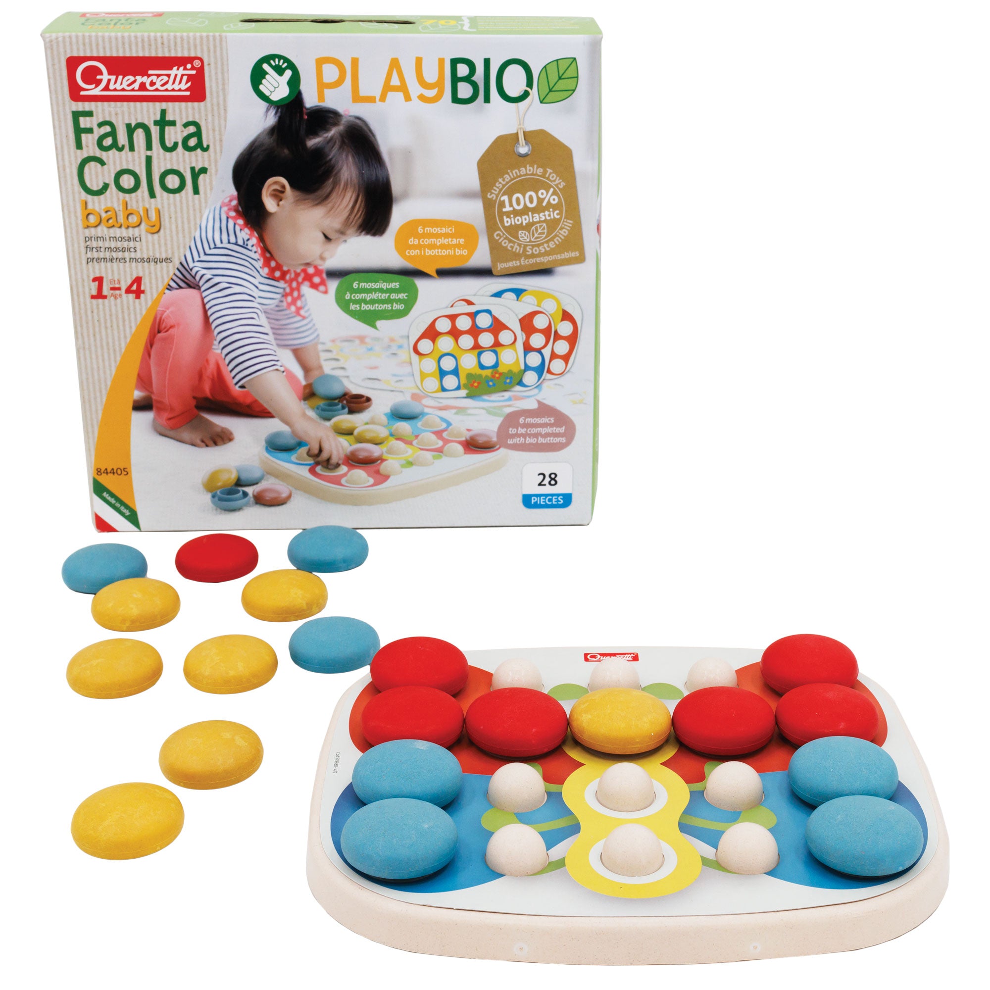Quercetti Fanta Color Baby setup with a butterfly picture placed over pegs and the round pieces placed on top of some of the pegs. On left side are several round pieces. The pieces are red, yellow, and blue. In the background is the product box with a black-haired baby on the cover playing with the butterfly puzzle.