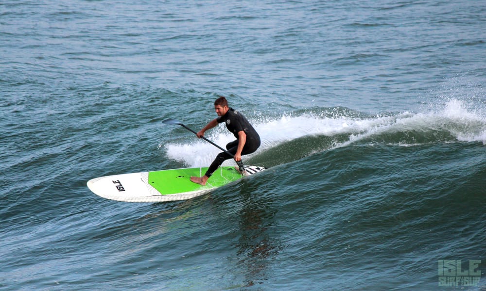 isle rider dirk on an a versa is paddle board riding waves mexico