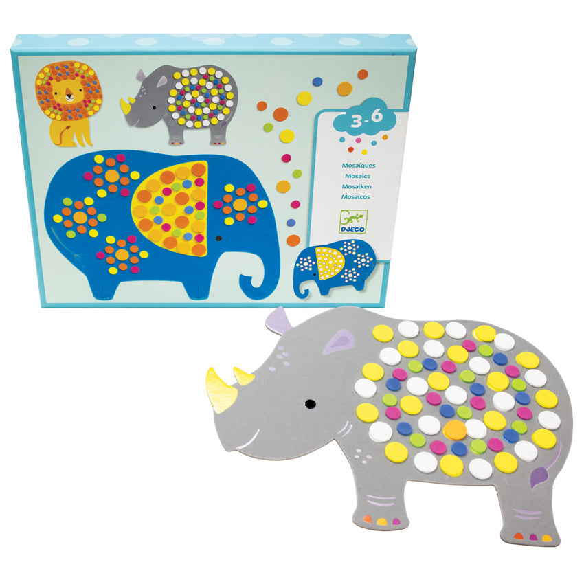 The Djeco Soft Jungle Mosaics box with a rhino project laying to the side of the box. The box is standing up. It has a light blue background and a lion, rhino, and elephants on the cover. The rhino project in the lower-right shows many colored dots of various sizes all over the middle portion. The dots appear to be a soft foam.
