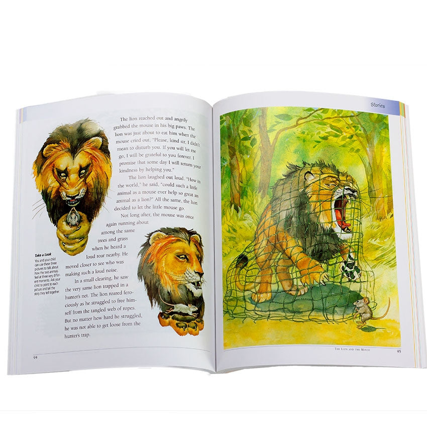 What Your Preschooler Needs to Know book open to show a story about a lion and a mouse. On the left page, you see 2 face and hand shots of the lion holding a mouse. One with the mouse tight in both paws, the other of it running free on top of 1 paw. There is text surrounding. The right page is a full illustration of a lion trapped in a net roaring and struggling and a mouse outside the net. There is a forest scene in the background.
