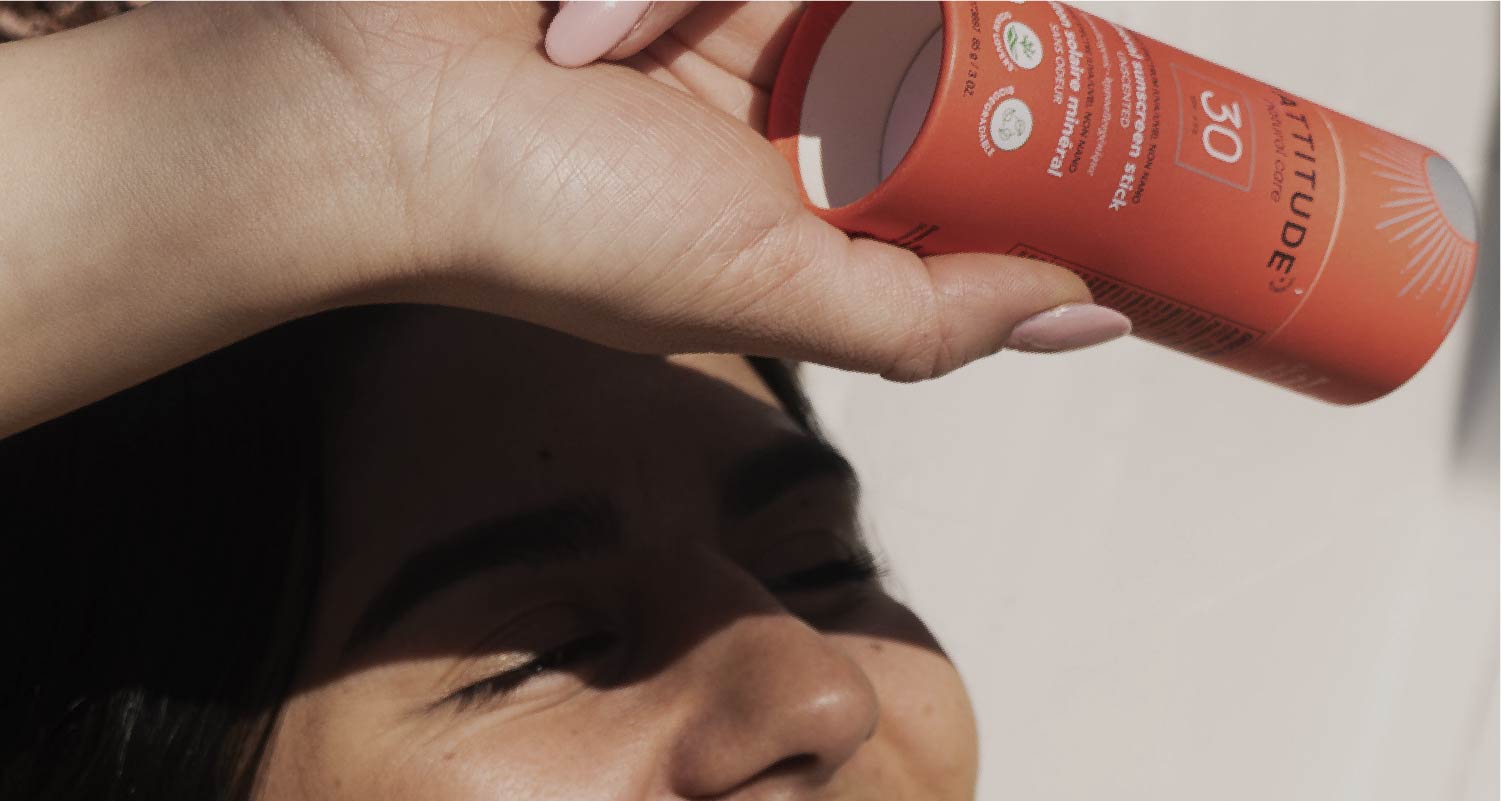 Woman Applying Sunscreen to Prevent Dry Skin after Winter Sports
