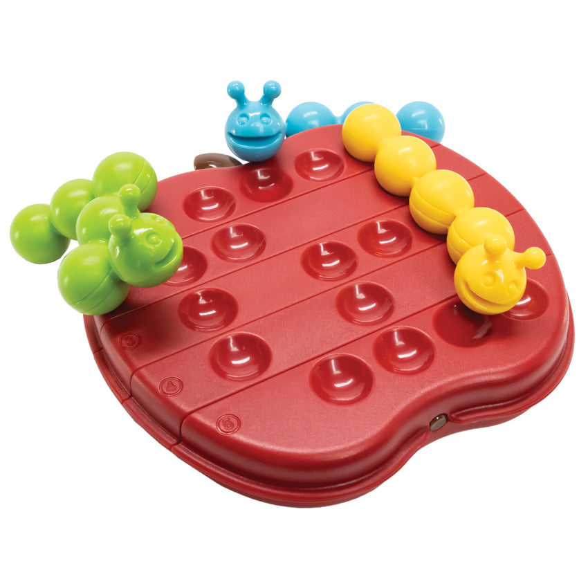 The Apple Twist Smart Game laid out with the green, blue, and yellow caterpillar pieces on top of the board. The apple game board is red with a brown stem and has lines through it, indicating that the pieces on the board can be twisted.