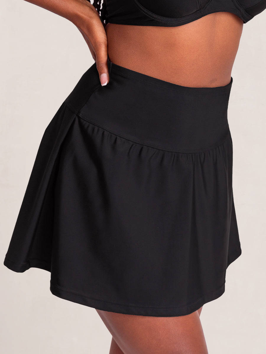 Swim Skirt high-profile waistband smooths your midsection