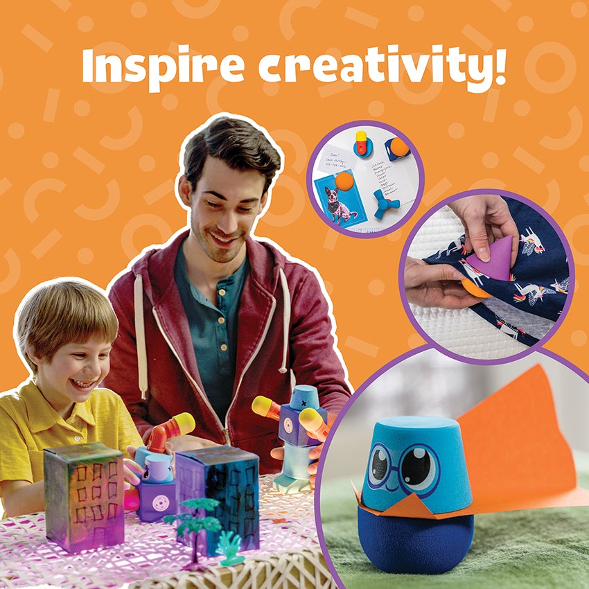 Block-a-Roo Once Upon a Stem being used by a father and son. They have created a town with fighting robots and are in the process of moving the robots toward each other. White text reading “inspire creativity” is over an orange background at the top. To the right, there are 3 circle images; one of the block pieces being used as fridge magnets, one showing the magnets works between fabric, and the character piece with a paper cape placed between the 2 body pieces.