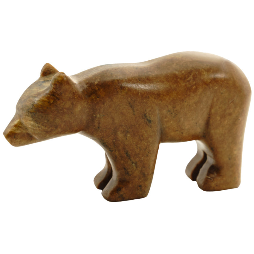 Brown bear soapstone figurine with a white background.